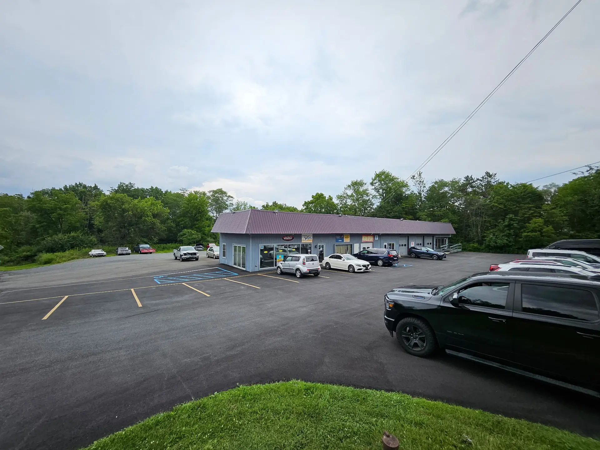 20260817_190301561_iOS Prime Four-Bay Service Garage & Investment Opportunity